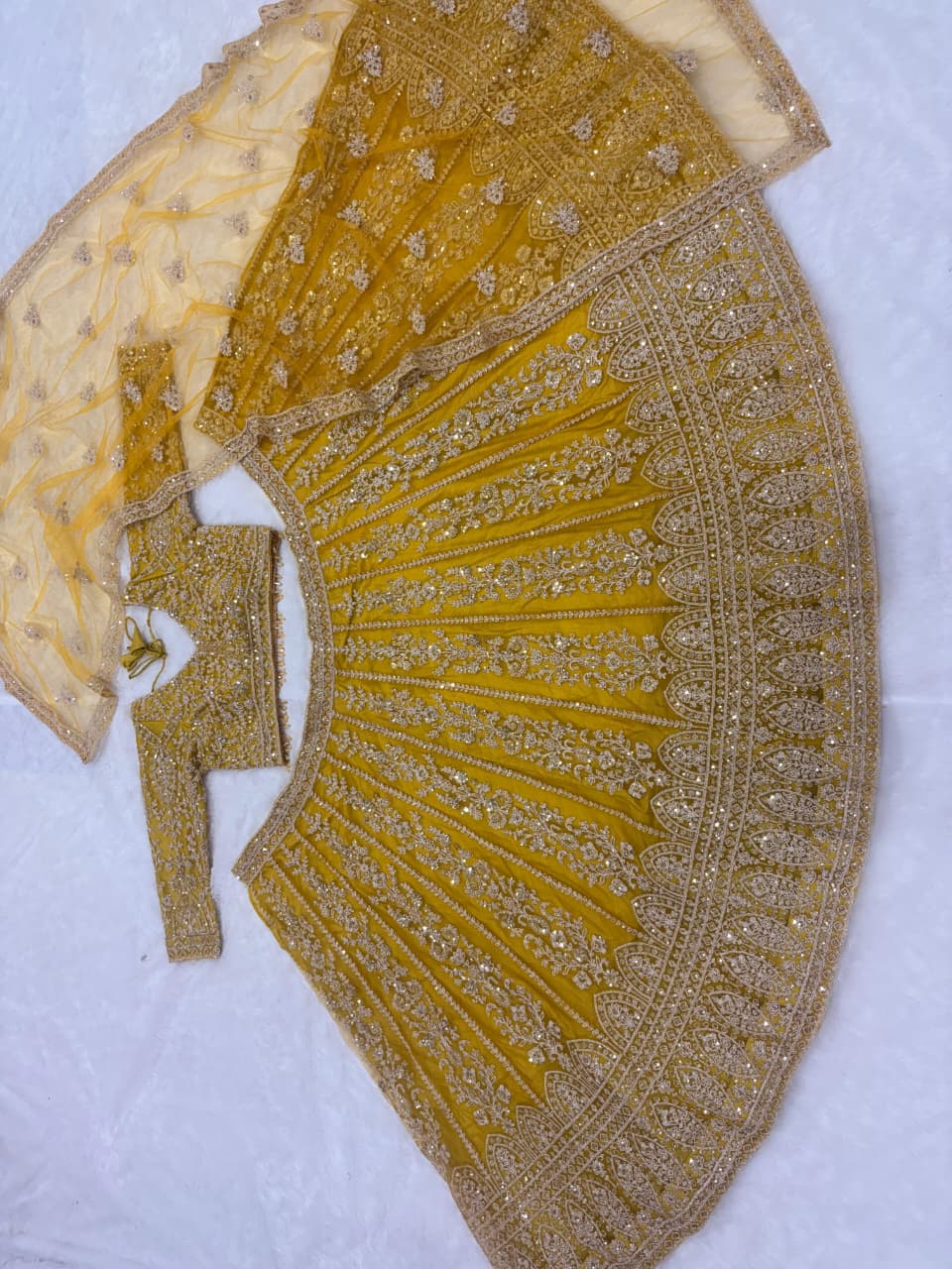 LUXURY BUTTERFLY SOFT NET LEHENGA WITH HEAVY EMBROIDERY AND 3.5 METER FLARE